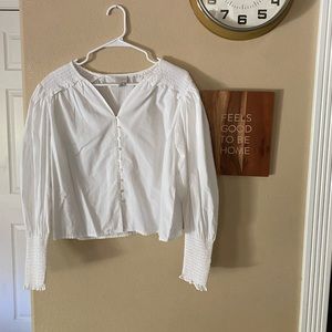Long sleeve, white shirt. Never been worn. Perfect condition. Size medium.